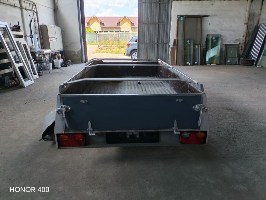 Remorca 750 kg adusa recent