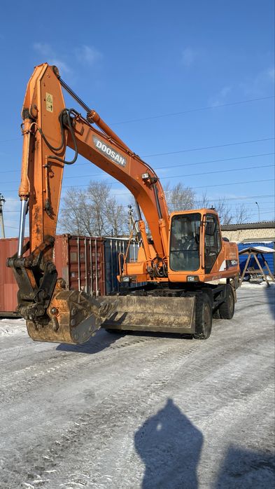 Колесный экскаатор 1 куб услуги