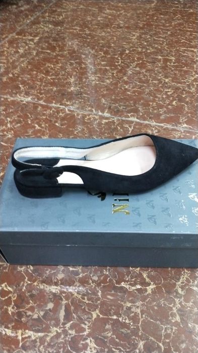 Босоножки . Новые.