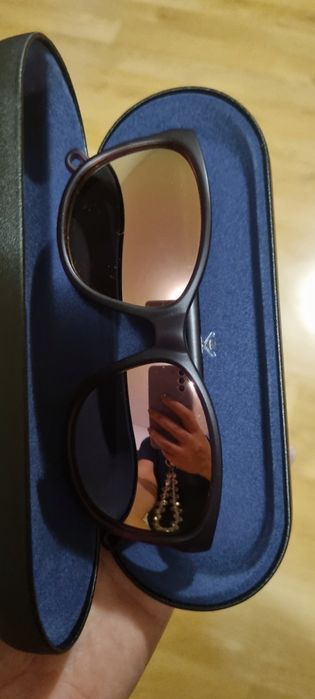 Слънчеви очила Декатлон с лилави огледални стъкла