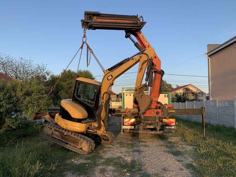 Transport camion cu macara si remorca