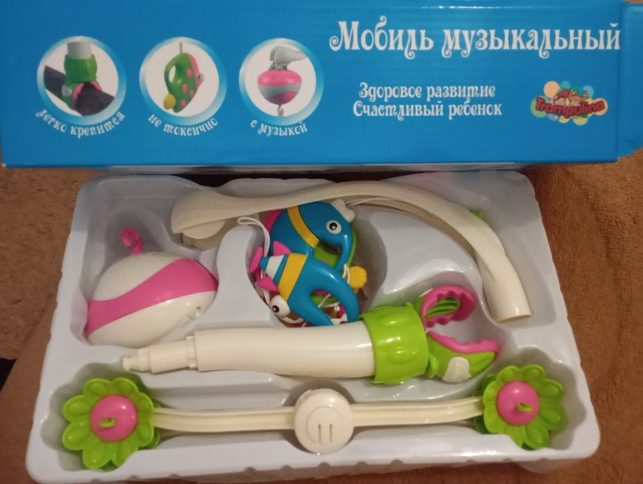 Продам музыкальную карусель в детский манеж