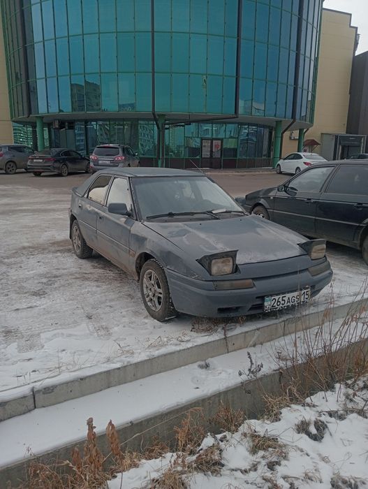 Продам срочно Mazda 323