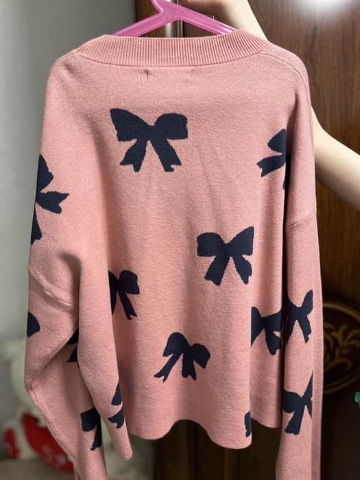 Теплая кофта с бантиками