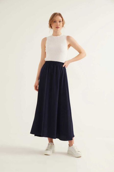 Юбка киген және жалаңаш волейболшылар