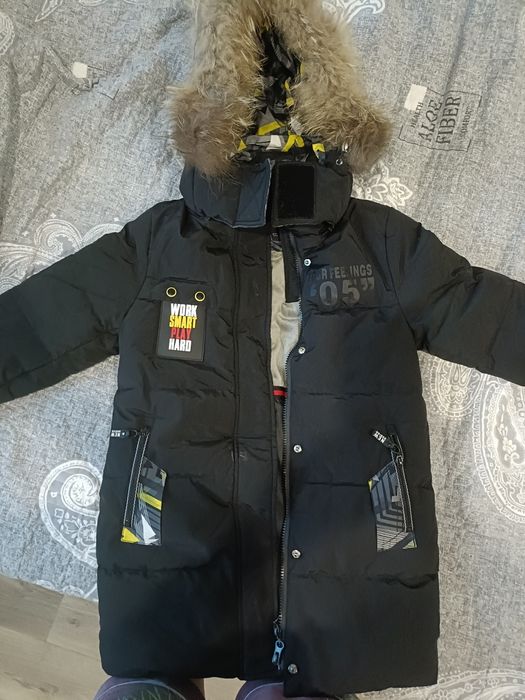 Продам зимний пуховик на мальчика