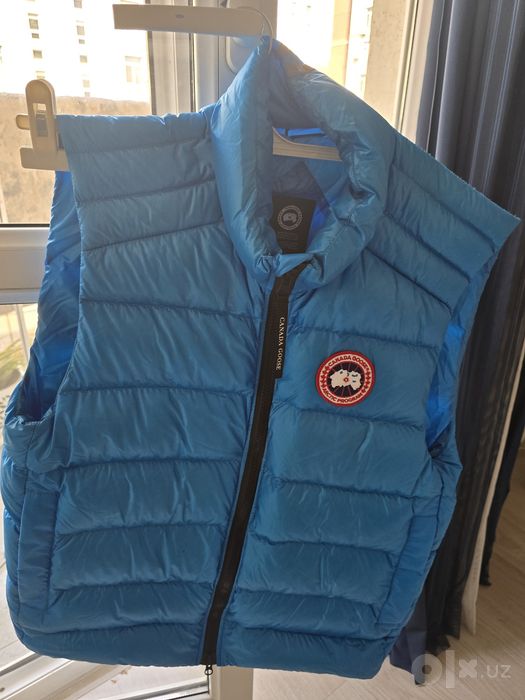 Продается оригинальный пуховой жилет Canada goose в новом состоянии