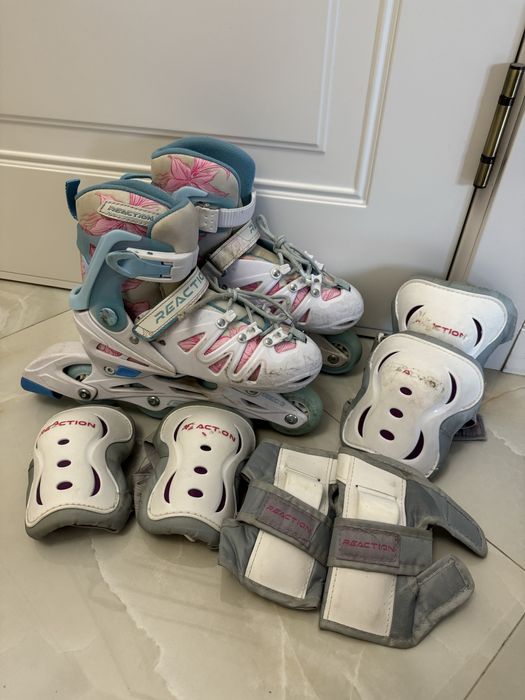 Роликовые коньки REACTION голубые 32-35 б/у