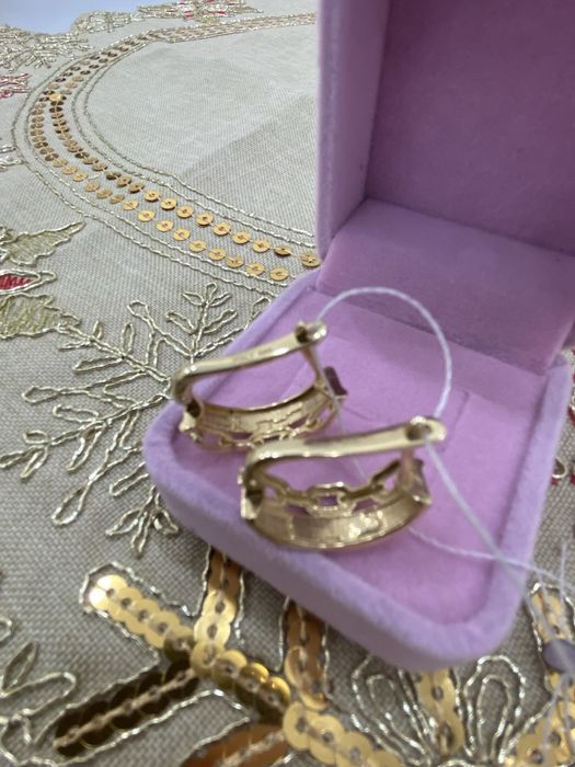 Золотые серьги Cartier