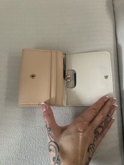 Портфейли чисто нови