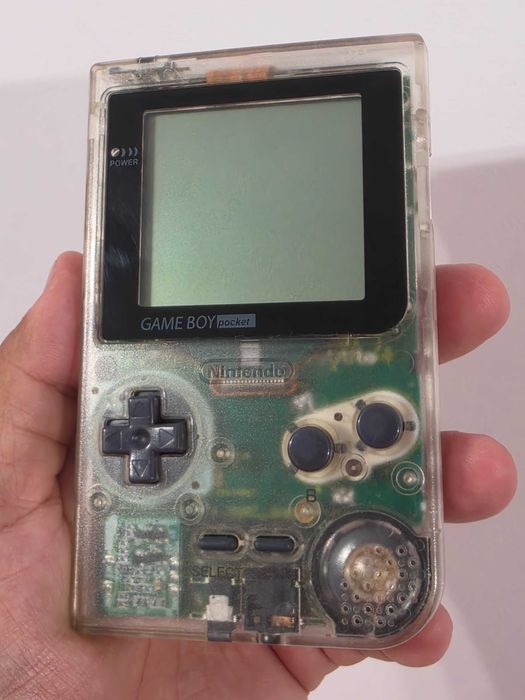 Nintendo Gameboy Poket transparent editie limitata si joc Aladdin