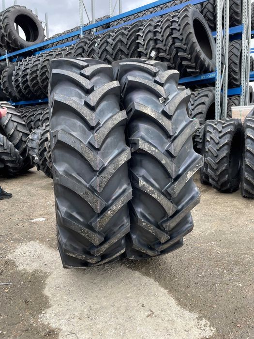 Cauciucuri noi 14.9-30 cu 10 pliuri marca OZKA pentru tractor spate