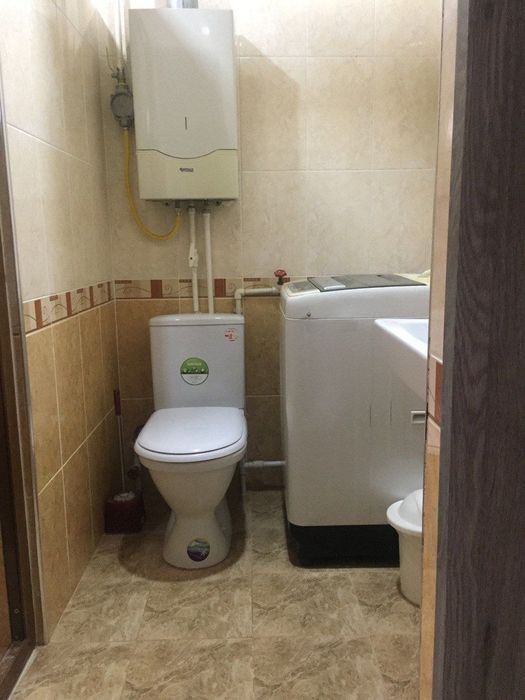 Квартира 5 комнат . Центр Янгиюля.