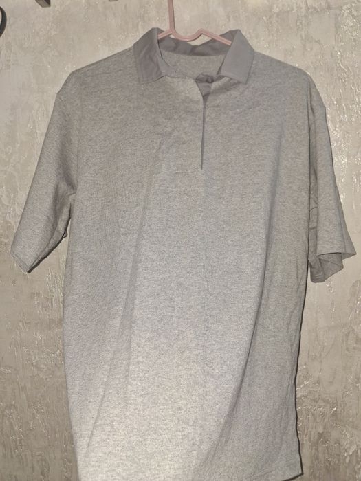 Поло серого цвета из  100% хлопка