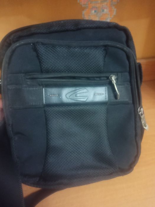 Барсетка не ношеная