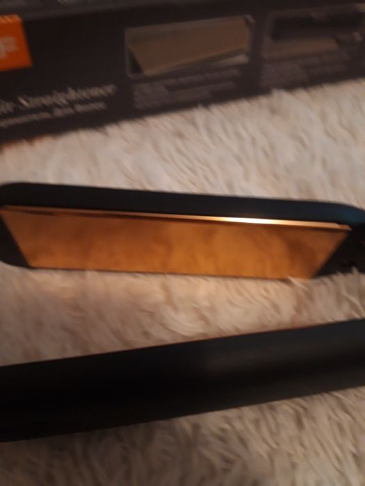 Утюжок для волос.