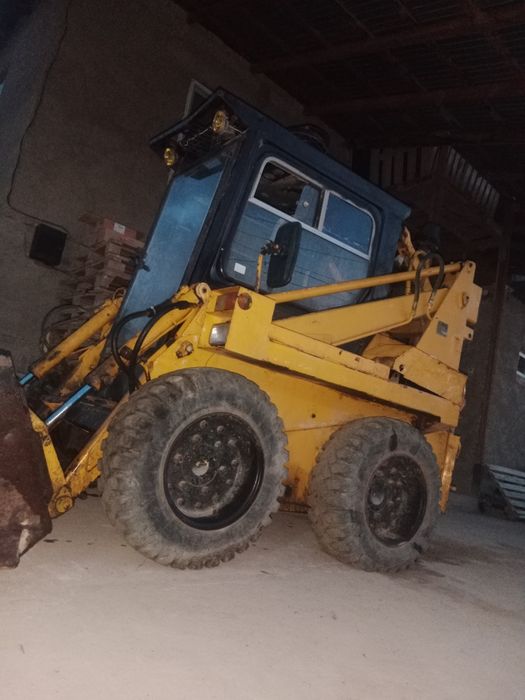 Бобеат погрузчик