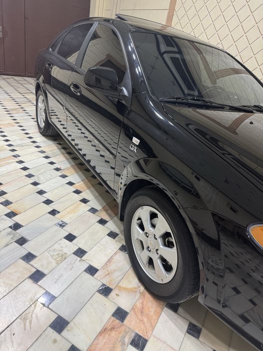 Jentra 1.5  qora gbo rangi