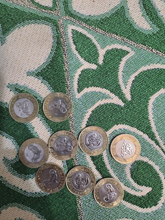 Именные манеты 100 тенге