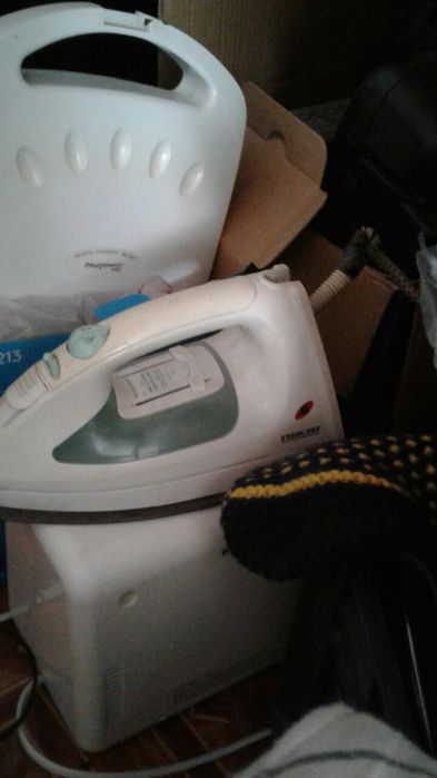 Утюг  на запасные части.