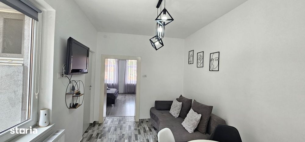 Apartament de vanzare cu terasă și beci, gata de utilizare
