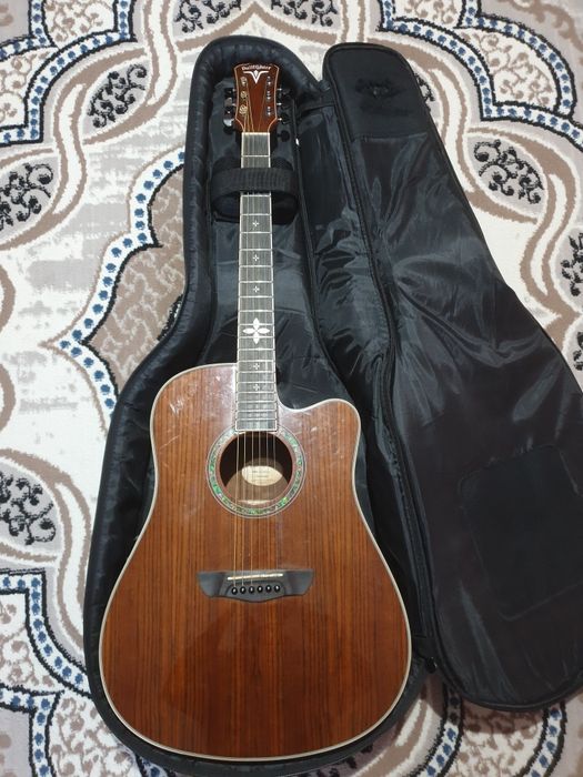 Классическая гитара . Xolati ideal 1 oy oshlatilgan rangi choko svet.