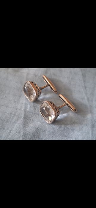 Запонки серебряные.