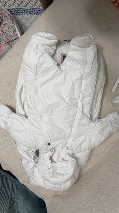 Продам новый комбинезон с конвертом