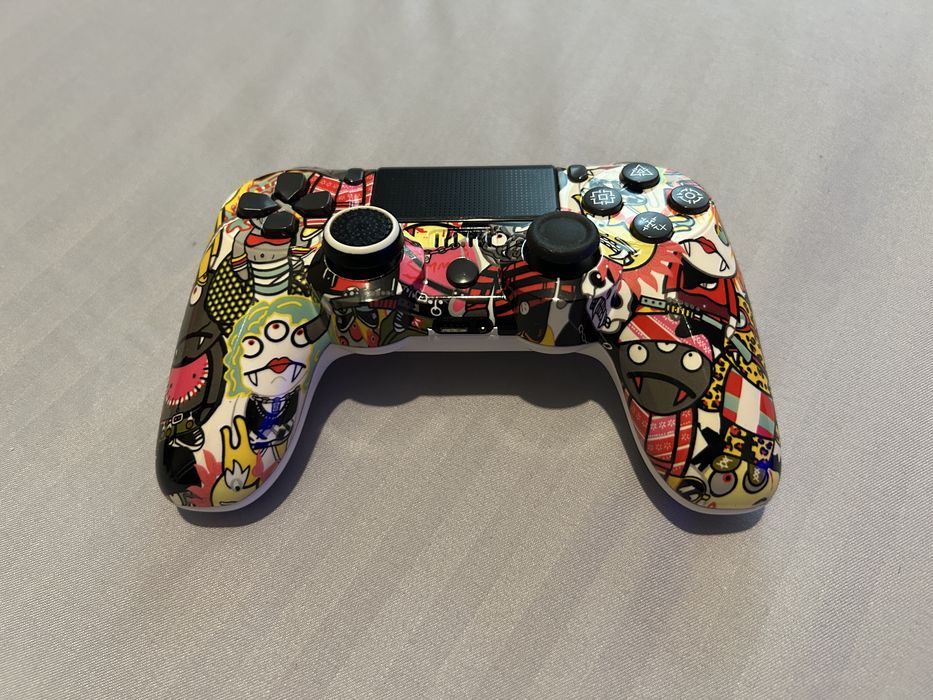 Consolă PS4 500GB + 4 manete + 9 jocuri
