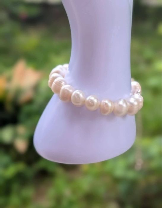 Veche bratara cu perle naturale de cultura, cu o prelungire cu un pandantiv stea, din argint de 925