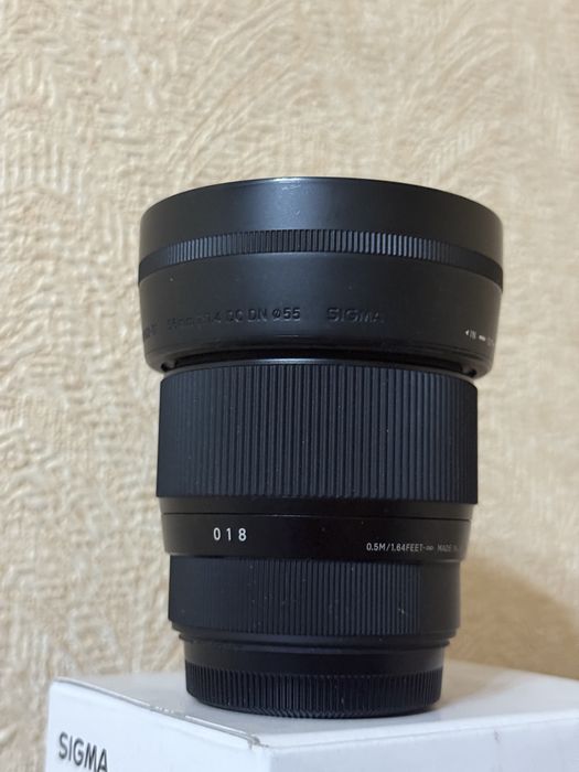 Sigma 56mm F1.4 объектив