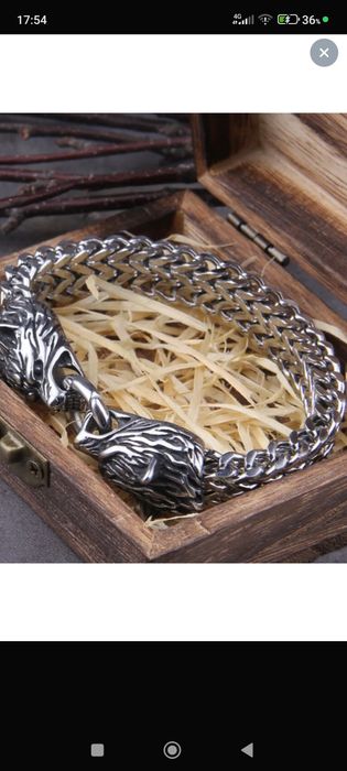 Браслет волк двух головой , и одна головой , серебреный.