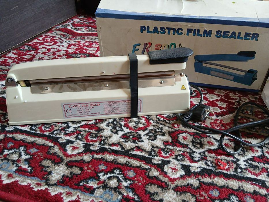 Пластик пленка йопиштирувчи аппарат