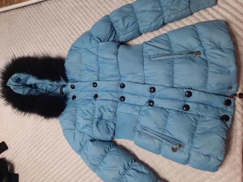 Продам пуховик голубой