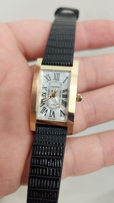 Золотые женские часы Cartier