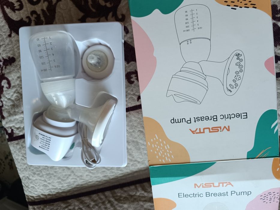 Продам молокоотсос электрический