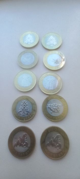 Монеты 100тг договорная