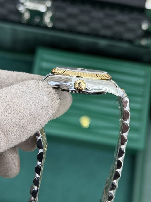 Rolex Datejust 31 Yellow Rolesor – Red Diamond Dial Jubilee