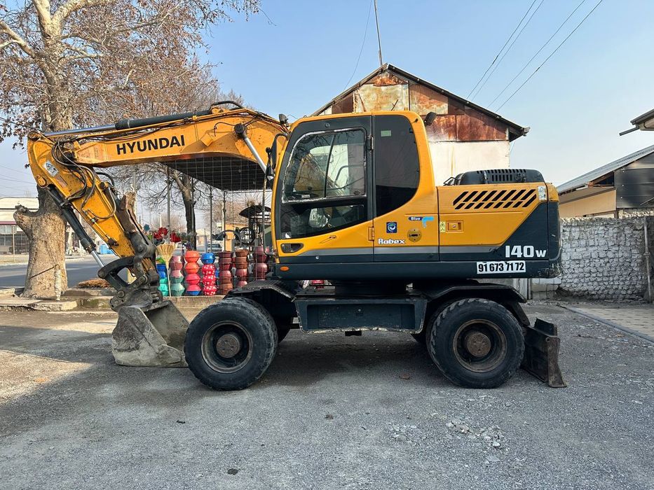 Экскаватор Хундай. Ekskavator hundai