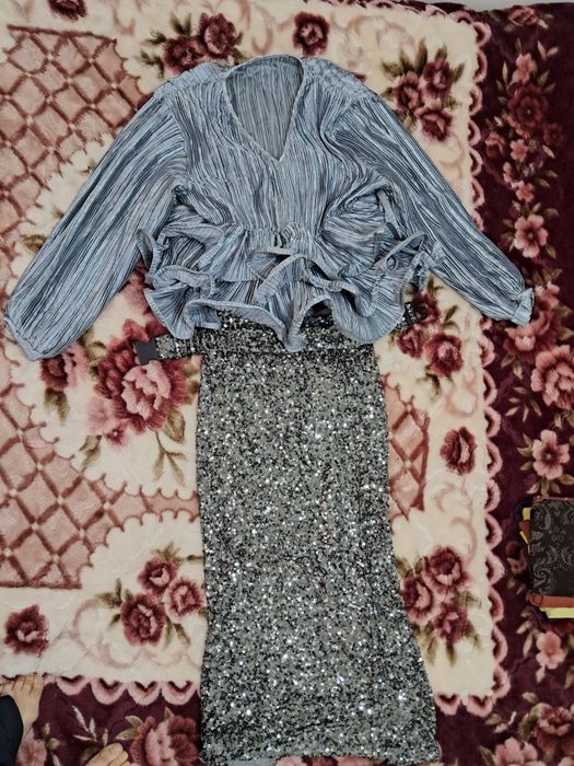 Одежды женские .