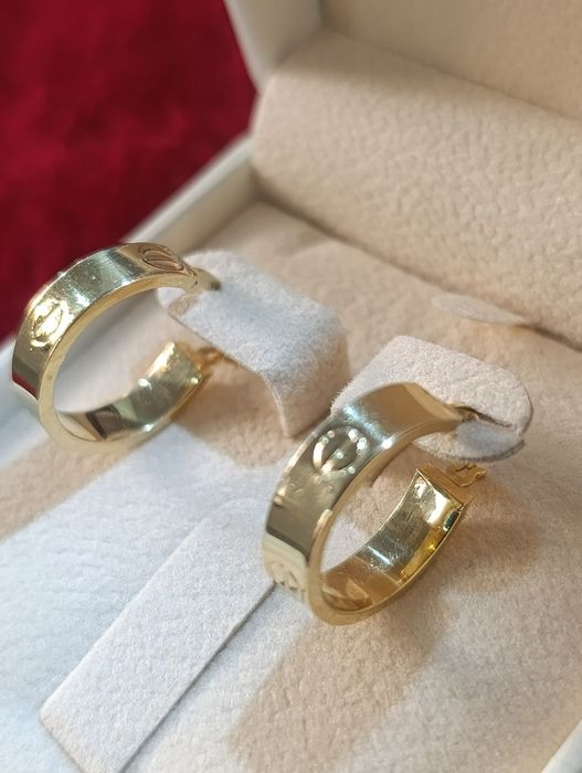 Золотые серьги CARTIER с кольцом, проба 585,вес 2,72,