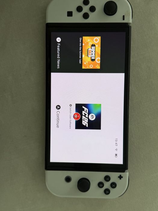 Nintendo Switch OLED White – Husă + 2 jocuri | Gata de utilizare