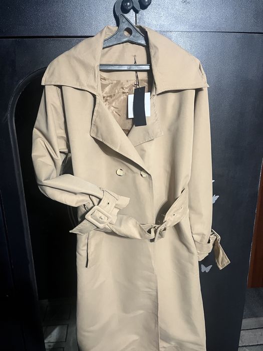 Продам тренч новый