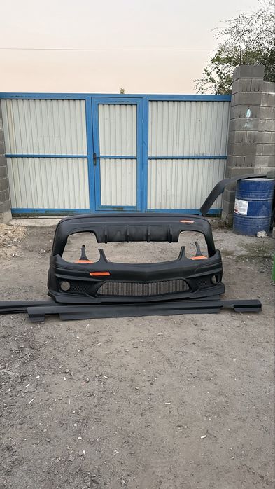 Передний бампер Мерседес 211 AMG 6.3