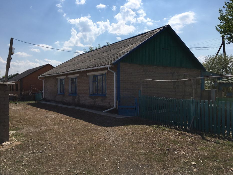 Дом с земельным участком