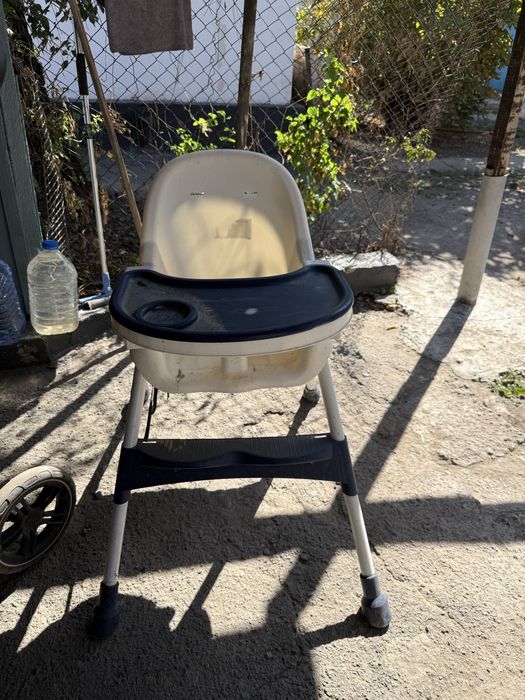 Продам коляску и детский стульчик