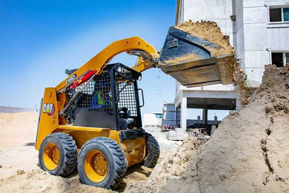 Колесный мини-погрузчик CAT [216B3] 2.6тон