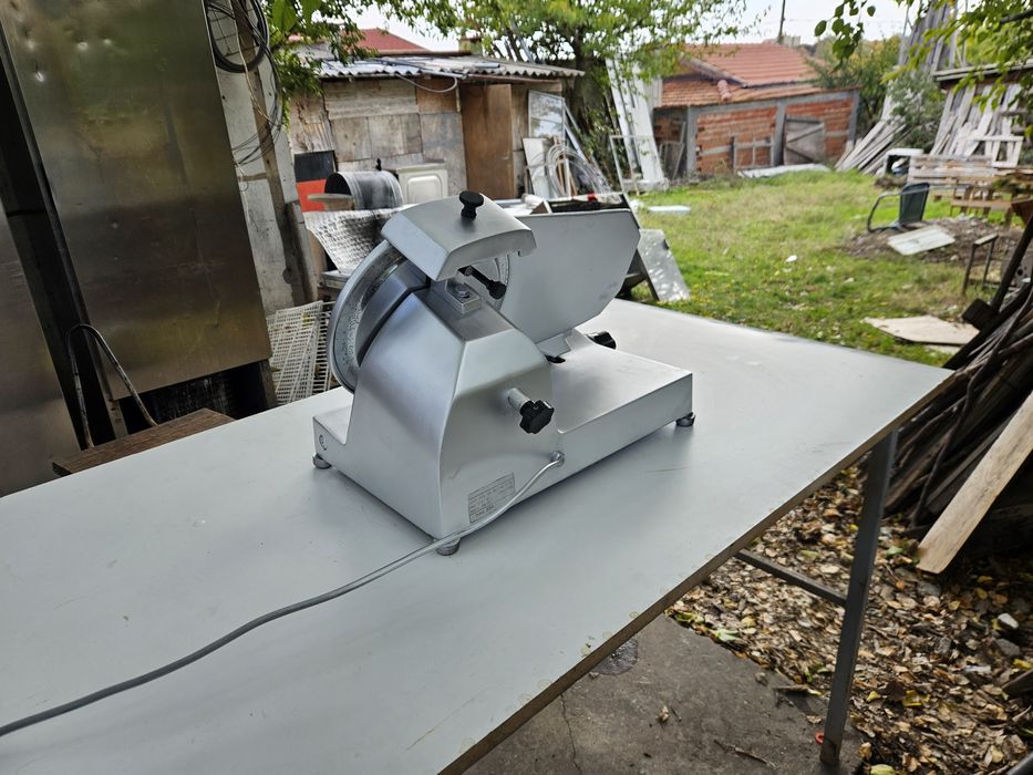 1.Колбасорезачка Професионална от неръждавейка Испания Вт. Употреба