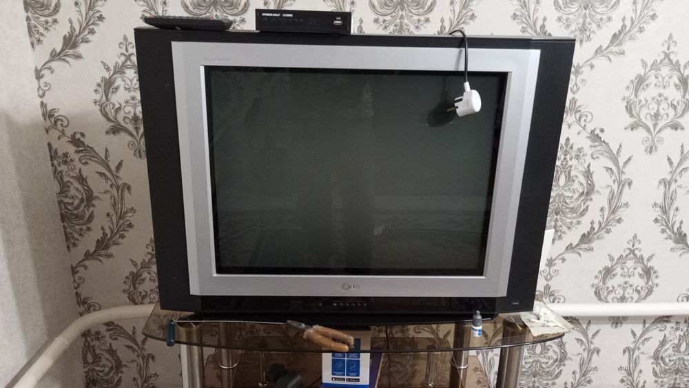 Телевизор приставкасымен