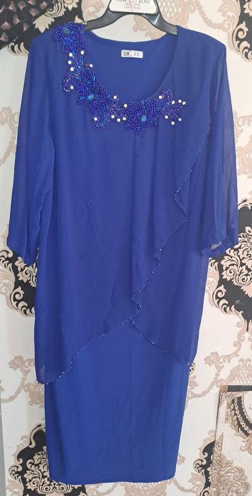 Toyga kiyishga koylak.